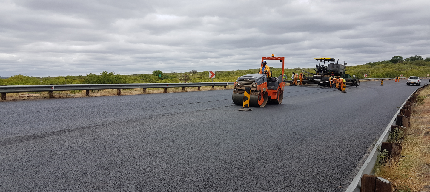 DIS Routine Road Maintenance Road Reseal Supervision alongside Tandem Vibratory roller and Tamper Bar Screed picture